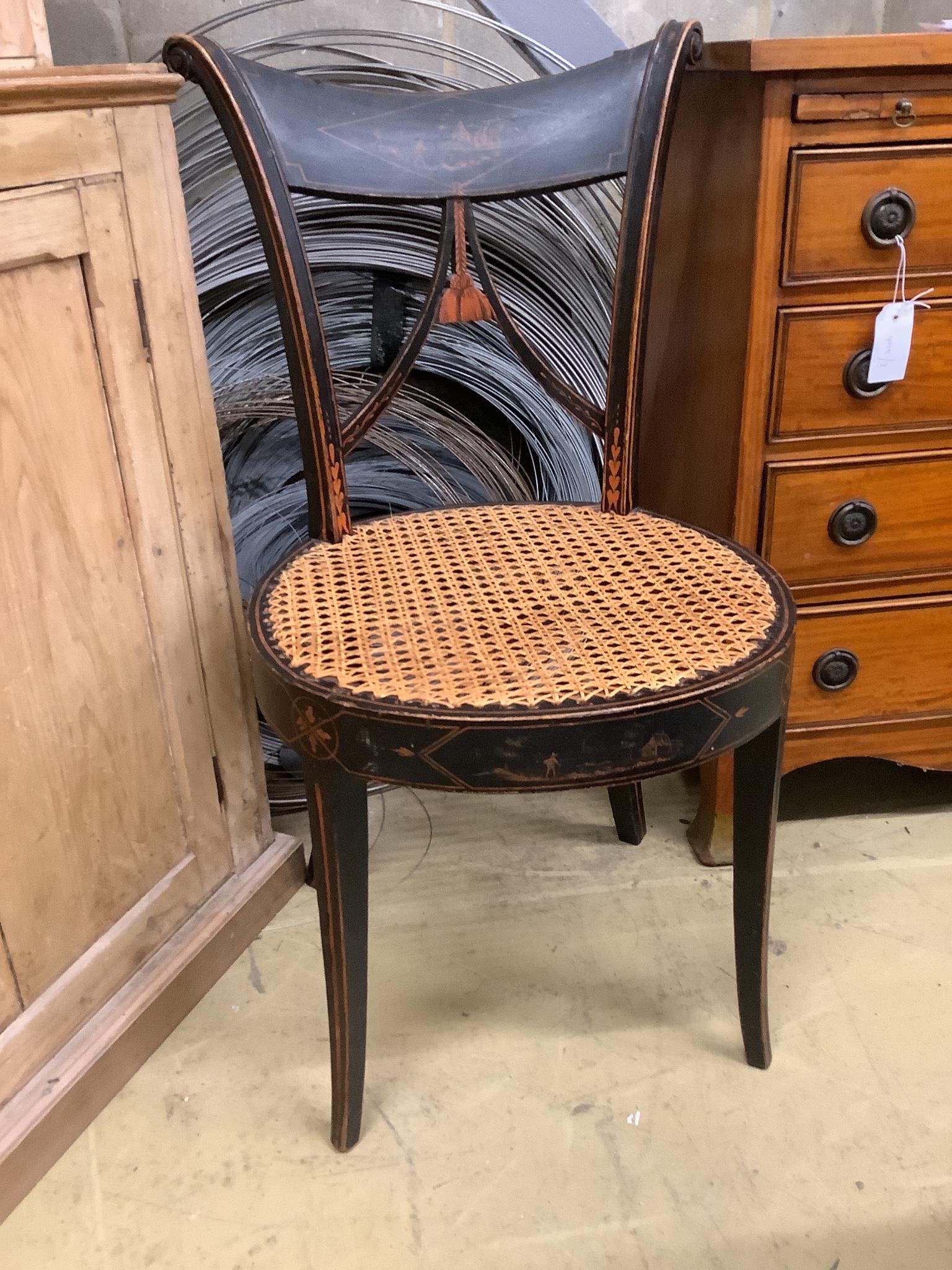 A pair of early 19th century Italian painted cane seated side chairs